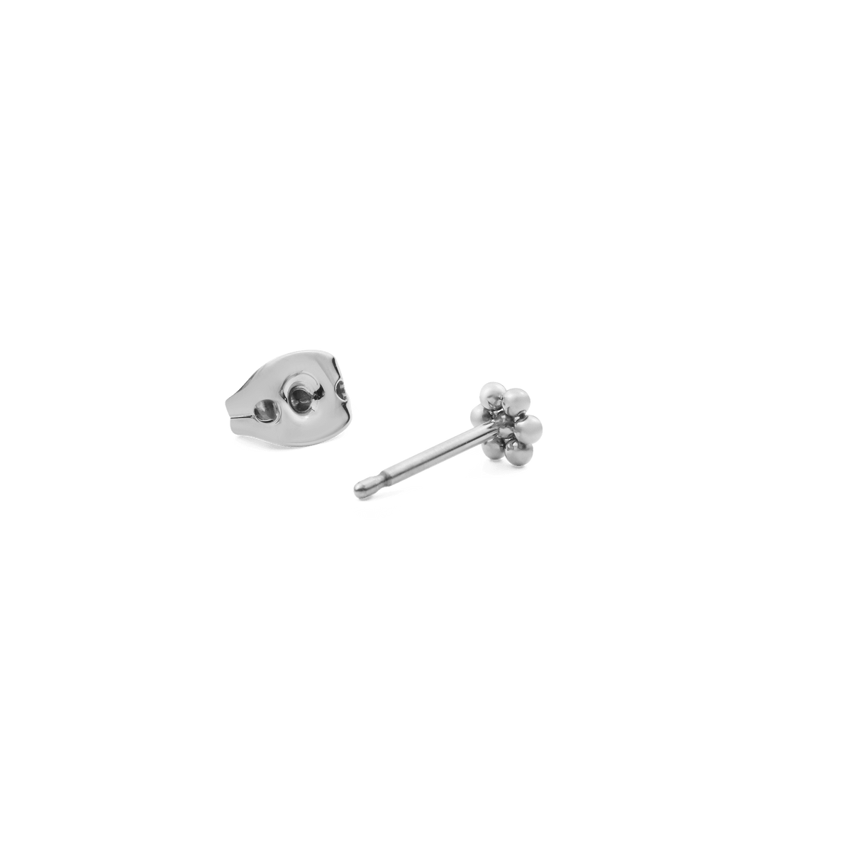 Flower Stud Silver earring shown with its butterfly backing, highlighting the petite floral shape and polished stainless steel finish suitable for sensitive ears.