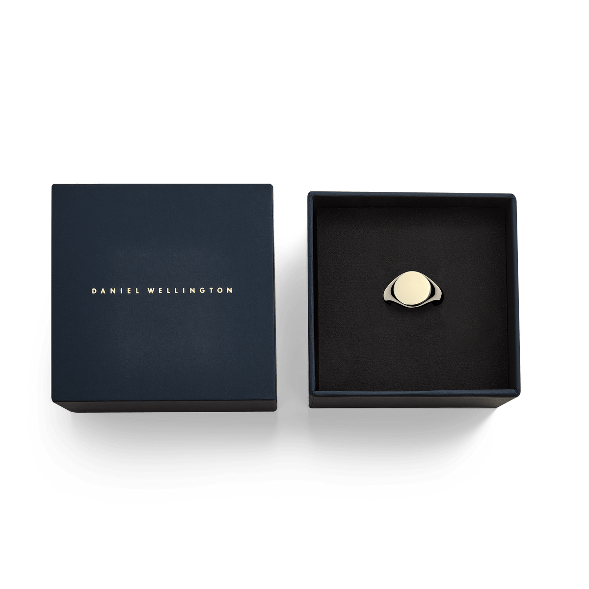 Classic Signet Ring Gold presented in an elegant Daniel Wellington gift box, highlighting its polished gold finish and minimalist design, ideal for gifting or special occasions.