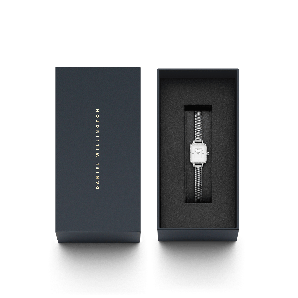 Quadro Mini Lumine Bezel Silver ladies watch presented in a sleek black Daniel Wellington gift box, featuring a crystal-studded bezel and silver mesh strap, ideal for gifting or festive occasions.