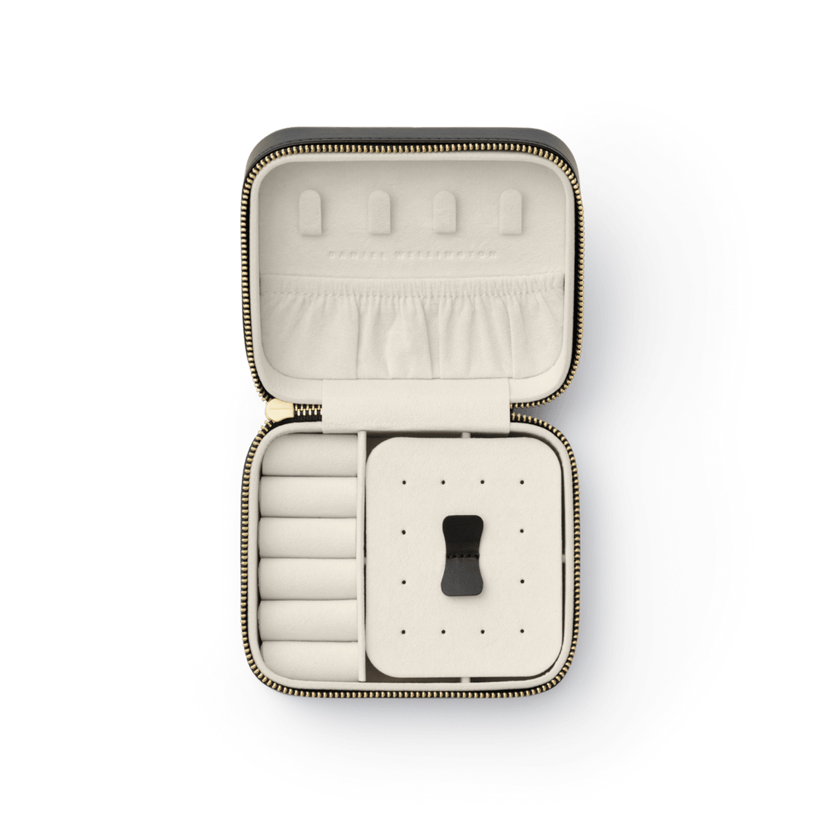 Travel Jewellery Box Black by Daniel Wellington with gold zip, open to display a soft cream interior featuring ring rolls, a pouch pocket, and a removable divider for organised travel accessory storage.