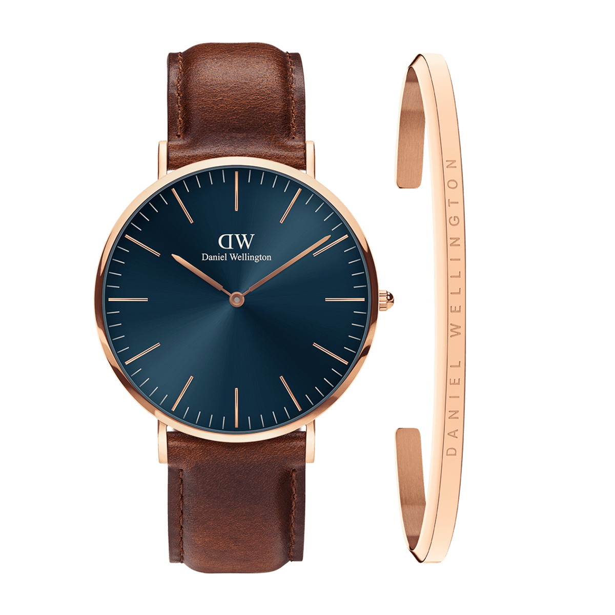 Classic St Mawes Arctic watch with a deep blue dial, rose gold case, and brown leather strap, paired with a slim rose gold bracelet engraved with Daniel Wellington branding.