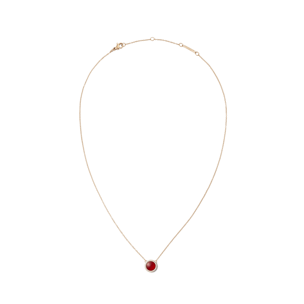 Rose gold necklace with a delicate chain, featuring a domed red agate stone pendant framed by a halo of white cubic zirconia crystals.