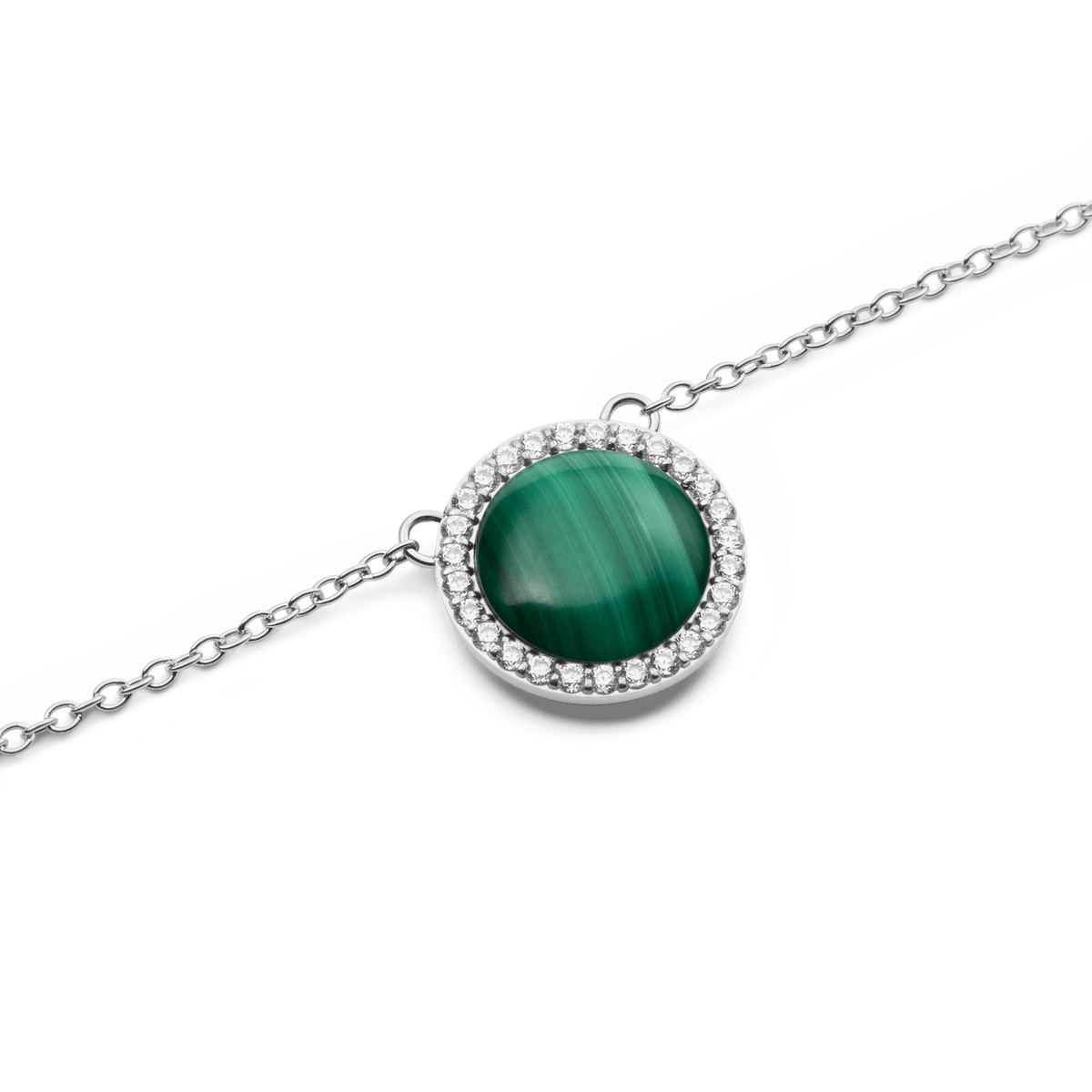 Close-up of the Audrey Necklace Malachite Silver pendant, featuring a domed green malachite stone surrounded by a halo of sparkling white cubic zirconia crystals on a fine silver chain.