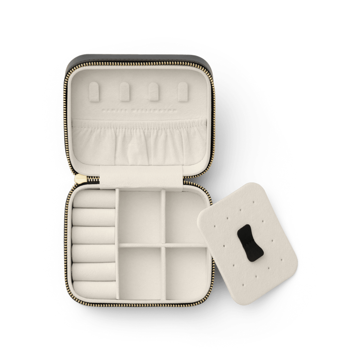 Travel Jewellery Box Black by Daniel Wellington with a gold zip, open to show soft cream lining, multiple compartments, ring holders, pouch pocket, and a removable divider for organised accessory storage.