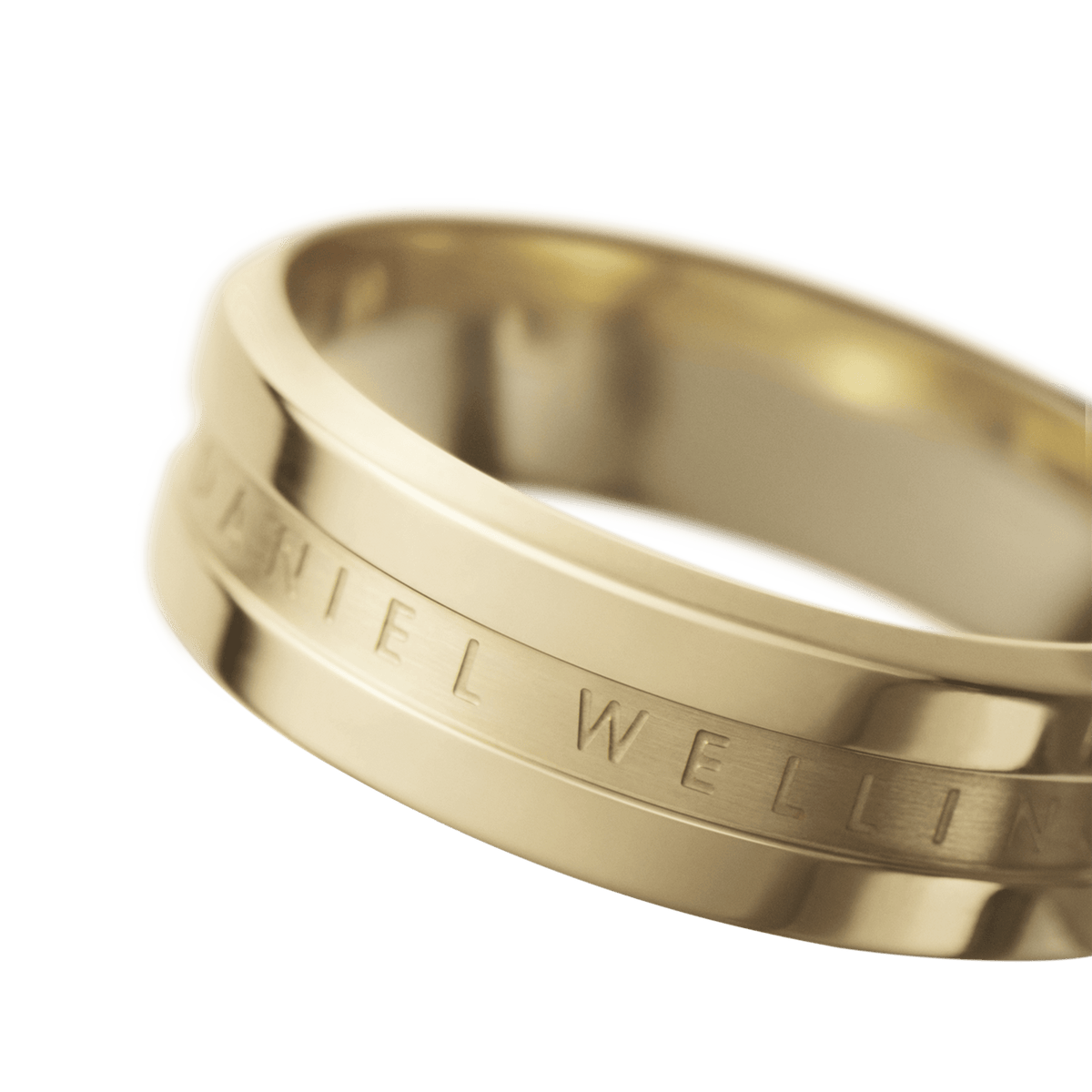 Close-up of the Elan Ring Gold showing its polished gold finish, minimalist band silhouette and engraved Daniel Wellington logo detail.