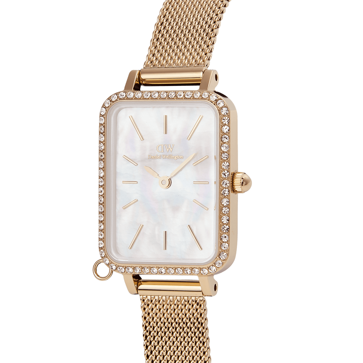 Close-up of the Quadro Crystal Zodiac Evergold Set gold ladies watch by Daniel Wellington, featuring a rectangular crystal-set bezel, white mother of pearl dial, minimalist gold hour markers, and an elegant gold mesh strap.
