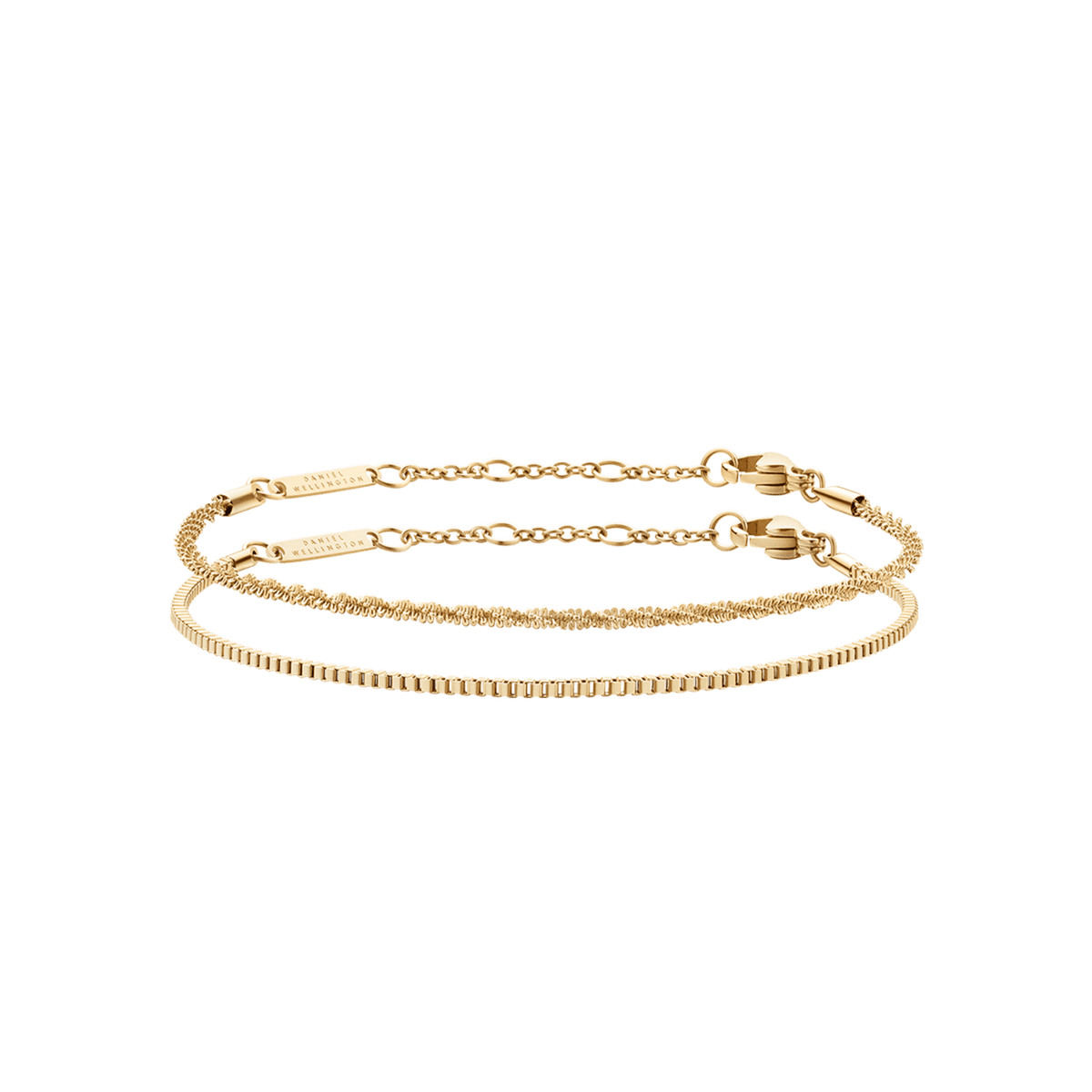 Two gold chain bracelets from the Staple Bracelet Set G, featuring delicate links and adjustable clasps, styled for versatile layering or solo wear.