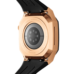 Back view of the Switch Rose Gold Apple Watch case showing the brushed rose gold stainless steel finish, engraved details, and integrated black FKM rubber strap, designed for secure fit and durability.