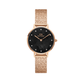 Rose gold ladies watch with a pressed piano link strap, black mother of pearl dial, and crystal markers, designed for everyday wear and elegant styling.
