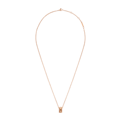 Elevation Necklace in rose gold with an adjustable cable chain and a geometric ring pendant, designed for versatile styling and everyday elegance.
