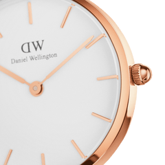 Close-up of the Petite Suffolk Rose Gold ladies watch highlighting the rose gold case, minimalist white dial, and slim rose gold hands, showcasing its refined and elegant design.