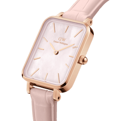 Quadro Pressed Rouge ladies watch with a rectangular rose gold case, pink mother of pearl dial, and nude pink croc-pattern leather strap, shown in a close-up side angle.