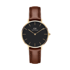 Petite St Mawes Black Gold features a 32mm gold-plated case, minimalist black dial, and a genuine brown leather strap, offering a refined and versatile wrist watch for women.