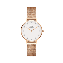 Rose gold Daniel Wellington Petite Lumine Pressed Melrose ladies watch with a minimalist white dial, crystal hour markers, and an adjustable pressed mesh strap.