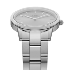 Iconic Link Unitone Silver ladies watch featuring a seamless stainless steel bracelet, minimalist silver dial and slim case, shown from a front angle to highlight its modern monochrome design.