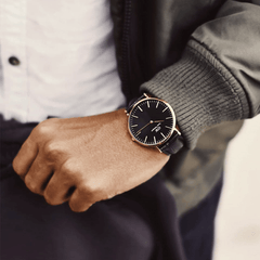 Classic Reading Black Rose Gold watch worn with a white shirt and dark jacket, showcasing its croc-embossed black leather strap and slim rose gold case for a smart, versatile look suitable for both work and casual settings.