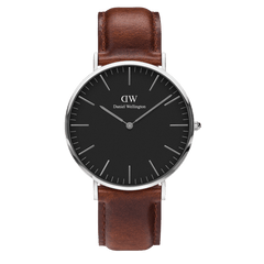 Classic St Mawes Black Silver watch with a black minimalist dial, slim silver case, and a smooth brown leather strap, showcasing a timeless and versatile design.