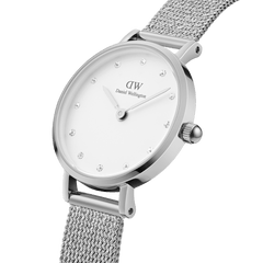 Petite Lumine Pressed Sterling showcases a slim 28mm stainless steel case, an eggshell white dial with crystal hour markers, and a refined silver mesh strap for a modern, elegant look.