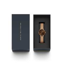 Petite Amber Rose Gold ladies watch with an amber brown dial and rose gold mesh strap, elegantly presented in a branded Daniel Wellington gift box, ideal for gifting or adding to your collection.