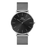 Classic Mesh Onyx silver watch with a black sunray dial, slim line markers, and a stainless steel mesh strap, showcasing a minimalist and modern design suitable for both casual and formal wear.