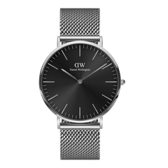 Classic Mesh Onyx silver watch with a black sunray dial, slim line markers, and a stainless steel mesh strap, showcasing a minimalist and modern design suitable for both casual and formal wear.