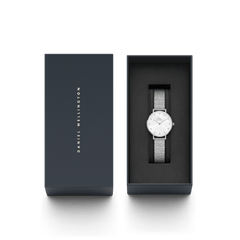 Petite Lumine Pressed Piano White MoP Silver ladies watch presented in a sleek Daniel Wellington gift box, featuring a white mother of pearl dial, crystal markers, and a shimmering silver pressed Studio Strap.