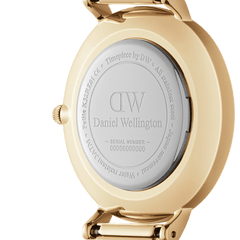 Back view of the Petite St Mawes Gold watch showing the engraved stainless steel case, gold finish, and water-resistant markings for durability and authenticity.