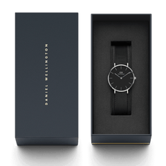 Petite Ashfield Silver presented in a sleek branded gift box, featuring a minimalist black dial and black stainless steel mesh strap, ideal for gifting or collecting.