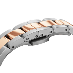 Detail view of the Iconic Link Lumine Rose Gold watch bracelet, featuring polished rose gold and silver stainless steel links with an adjustable clasp for a secure and comfortable fit.