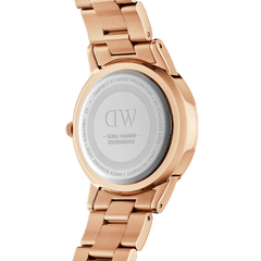 Back view of the Iconic Link Unitone RG rose gold ladies watch, showing the stainless steel case back, engraved details, and polished rose gold link bracelet.