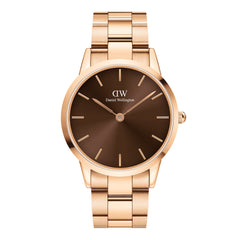 Daniel Wellington Iconic Link Amber watch with a rose gold stainless steel bracelet and a sunray brown dial, featuring minimalist hour markers and a modern, elegant design.