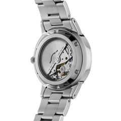 Exhibition case back of the Daniel Wellington Iconic Link Automatic watch, showing the self-winding movement and polished stainless steel bracelet.
