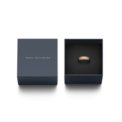 Emalie Ring Desert Sand Rose Gold displayed in an elegant Daniel Wellington gift box, highlighting the rose gold band with desert sand enamel and engraved logo, ideal for gifting or adding to a jewellery collection.