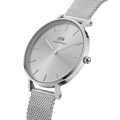 Petite Unitone Silver features a sleek round dial with minimalist silver markers and an adjustable stainless steel mesh strap, designed for a comfortable and elegant fit on petite wrists.