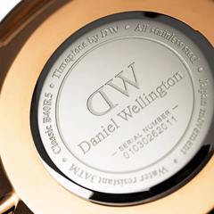 Engraved stainless steel case back of the Classic Glasgow Rose Gold watch, showing water resistance rating, Japanese movement details, and serial number for authenticity.