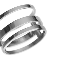 Close-up of the Elan Triad Ring Silver showing its three polished silver bands and open, layered design, crafted from stainless steel for a modern, minimalist look.