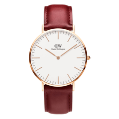 Classic Suffolk Rose Gold watch with a slim rose gold case, minimalist eggshell white dial, and a rustic red genuine leather strap, suitable for both men and women.