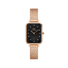 Quadro Lumine Pressed Piano Black MoP Rose Gold ladies watch featuring a rectangular rose gold case, black mother of pearl dial with crystal markers, and a textured piano link bracelet.
