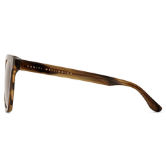 Side view of Grande Bio-Acetate Brown Demi sunglasses showing the brown demi patterned temple with Daniel Wellington branding and a smooth, lightweight finish.