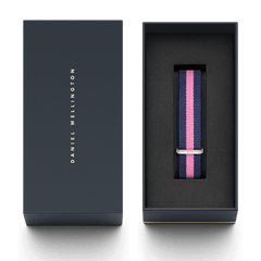 Winchester Strap Silver presented in a sleek Daniel Wellington gift box, featuring a navy blue and pink striped NATO style watch strap with a polished silver buckle.