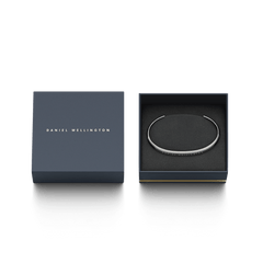 Classic Bracelet Silver by Daniel Wellington presented in elegant packaging, featuring a slim, polished stainless steel cuff displayed in a branded gift box.