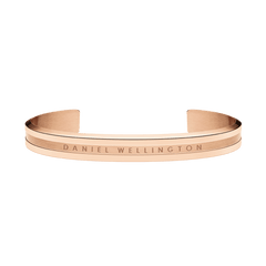 Rose gold Elan Bracelet by Daniel Wellington featuring a minimalist open cuff design, polished finish, and engraved logo, crafted from stainless steel with PVD plating.