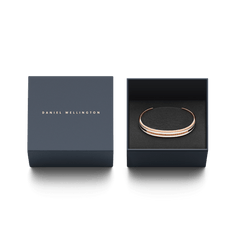 Emalie Slim Bracelet Rose Gold presented in a stylish Daniel Wellington gift box, highlighting its rose gold and white enamel design as a sophisticated jewellery gift option.