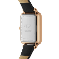 Rear view of the Quadro Pressed Sheffield Rose Gold watch showing the stainless steel case back, rose gold finish, and black leather strap with visible stitching.