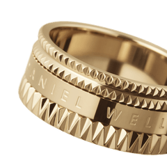 Close-up of the Elevation Ring Gold showing its bold gold finish, geometric textured detailing, and engraved branding, highlighting the premium craftsmanship and modern design.