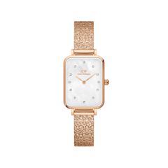Quadro Lumine Pressed Piano White MoP Rose Gold ladies watch with a rectangular mother of pearl dial, crystal hour markers, and a textured rose gold piano link bracelet.