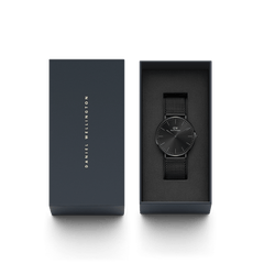 Classic Mesh Onyx Black watch presented in a sleek branded gift box, featuring a minimalist black dial and woven stainless steel mesh strap, ideal for gifting or everyday wear.