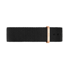 Black NATO-style watch strap made from durable polyester, featuring a rose gold buckle and minimalist design, suitable for a range of watch sizes.
