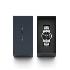 Daniel Wellington Iconic Link Automatic watch with a black dial and stainless steel bracelet, presented in an elegant branded gift box.