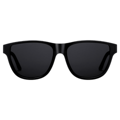 Ambler Bio-Acetate Black sunglasses with a modern classic silhouette, featuring a sleek all-black Italian bio-acetate frame and dark UV400 protective lenses.